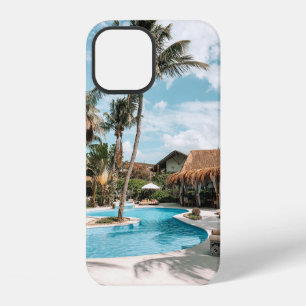 Thatch huts and houses by the pool during day iPhone 12 case