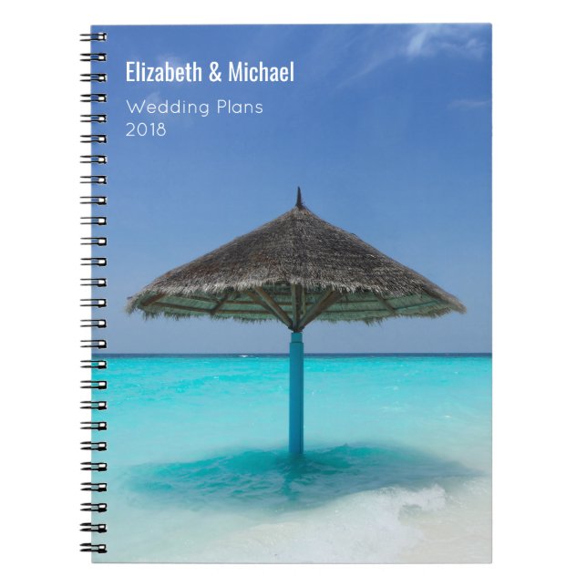 Thatched Umbrella on Tropical Beach Wedding Plans Notebook (Front)