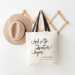 The Adventure Begins | Custom Wedding Welcome Tote Bag<br><div class="desc">Welcome guests to your wedding weekend or destination wedding with these chic and modern personalised tote bags. Design features "and so the adventure begins" in classic black hand lettered script,  with your names and wedding date beneath.</div>