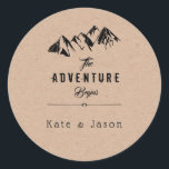 The Adventure Begins ⎥Rustic Round Sticker<br><div class="desc">Personalise this "The adventure begins" round sticker and change name,  date,  font or paper colour to make it your own. This design has a beautiful vintage feel with a careful choice of fonts and illustrations</div>