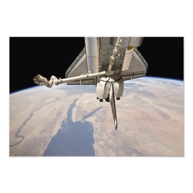 The aft section of the docked space shuttle photo print (Front)