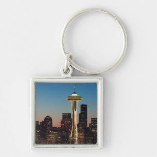 The American flag flies between the rising moon Key Ring