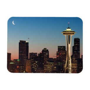The American flag flies between the rising moon Magnet