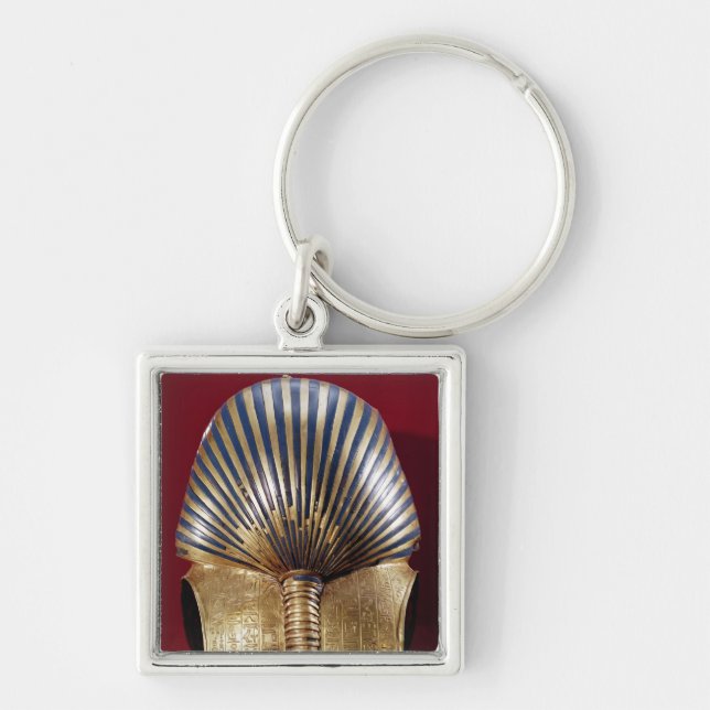 The back of the gold mask key ring (Front)
