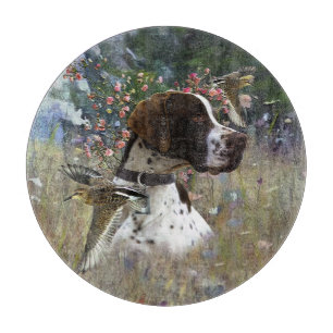 The beautiful pointer in the field  cutting board