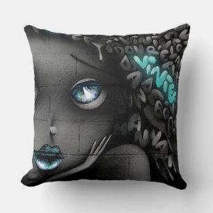 The black and white and turquoise graffiti woman cushion