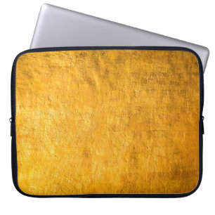 The brass concrete surface glows from the walls of laptop sleeve