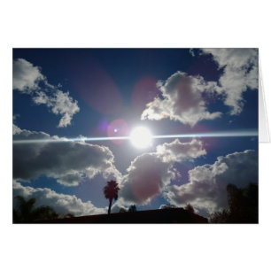 The Bright Sun Shining Through the Silver Clouds