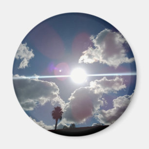The Bright Sun Shining Through the Silver Clouds Magnet