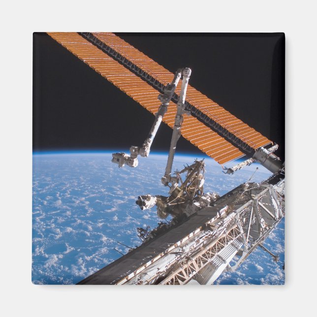 The Canadarm2 and solar array panel wings Magnet (Front)