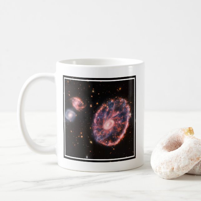 The Cartwheel Galaxy And Its Companion Galaxies. Coffee Mug (With Donut)