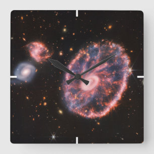 The Cartwheel Galaxy And Its Companion Galaxies. Square Wall Clock