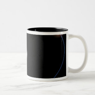 The clockwork-like orbits of a triple-star syst Two-Tone coffee mug