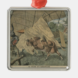 The cow and the aeroplane metal tree decoration