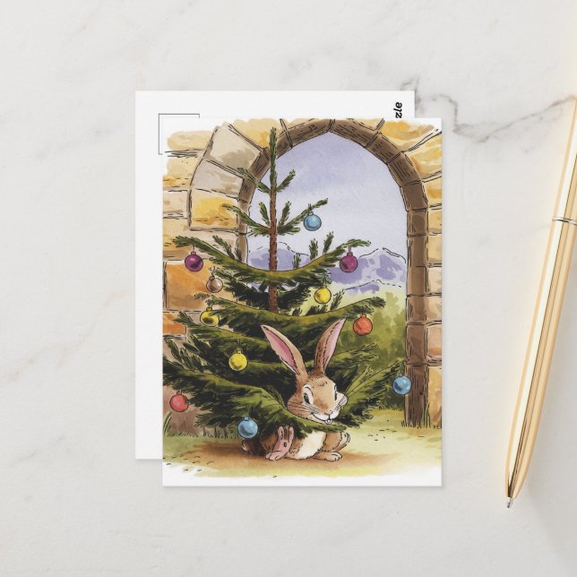 The Cute Little Christmas Bunny Nibbles the Tree Postcard (Front/Back In Situ)