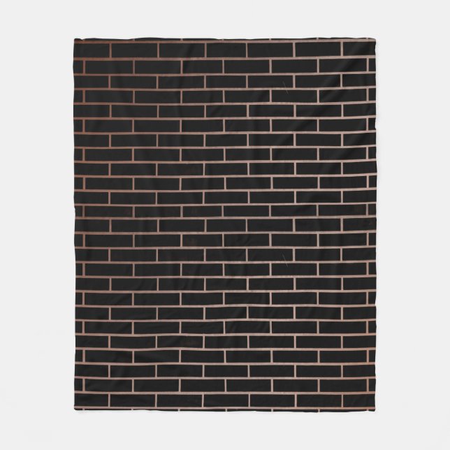 The dark black brick wall has a rough surface as a fleece blanket (Front)