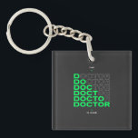 The Doctor Is Here Neon Text Design Key Ring<br><div class="desc">Bold and modern, this design features the phrase “The Doctor Is Here” with stacked typography in a vibrant neon green against a dark background. The repeating text creates a dynamic visual effect, blending minimalist style with a futuristic edge. Perfect for doctors, medical professionals, and students who want a sleek, confident...</div>