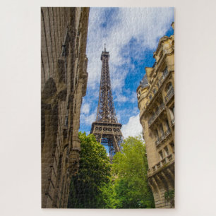 The Eiffel tower between buildings, Paris, France Jigsaw Puzzle