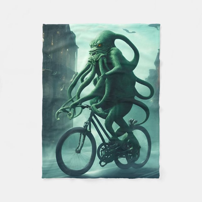 The Eldritch Cyclist: Cthulhu Rides a Bike Fleece Blanket (Front)