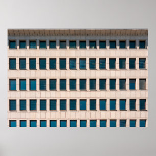 The facade of the modern building with rectangular poster