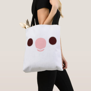 The face of a albino cockatiel tote bag