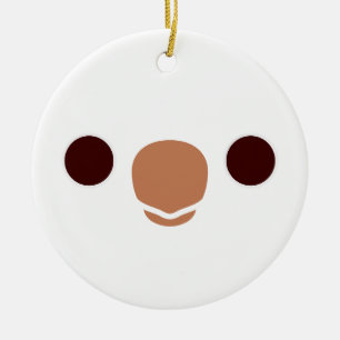 The face of a Albino Monk Parakeet Ceramic Ornament