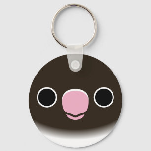 The face of a blue masked lovebird key ring