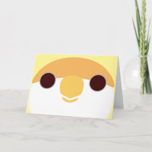 The face of a creamino peach-faced lovebird card