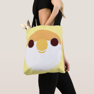The face of a creamino peach-faced lovebird tote bag