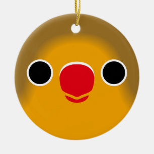 The face of a fischer's lovebird ceramic ornament