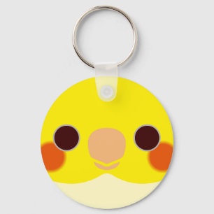 The face of a lutino cockatiel key ring