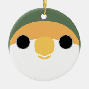 The face of a mauve peach-faced lovebird ceramic ornament