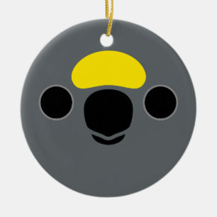 The face of a Meyer's Parrot Ceramic Ornament