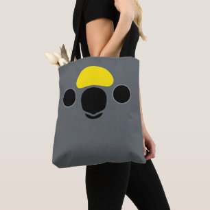 The face of a Meyer's Parrot Tote Bag