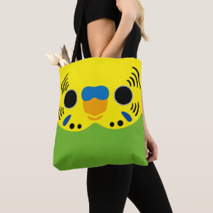 The face of a normal female budgie tote bag