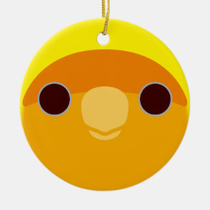 The face of a orange-faced lutino peach-faced love ceramic ornament