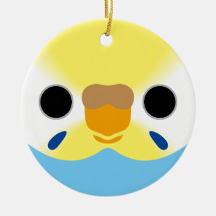 The face of a pastel rainbow female budgie ceramic ornament