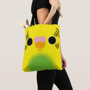 The face of a recessive pied budgie tote bag
