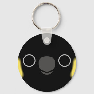 The face of a Yellow-tailed black cockatoo Key Ring