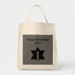 The Flame & Star - Tote Bag<br><div class="desc">This image is a flame from a candle. A star around the flame represents Hanukkah. Done in a black tattoo. A black backround was also added. "Happy Hanukkah 2014" is printed on this design. Customise with your own words. These totes are available in assorted styles,  colours and sizes.</div>