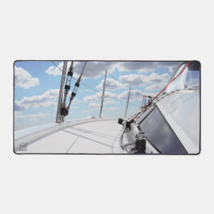 The gangway of a sailing yacht in clear weather. desk mat