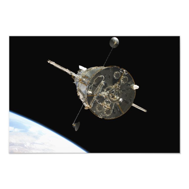 The Hubble Space Telescope in orbit above Earth Photo Print (Front)