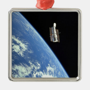 The Hubble Space Telescope with a blue earth Metal Tree Decoration
