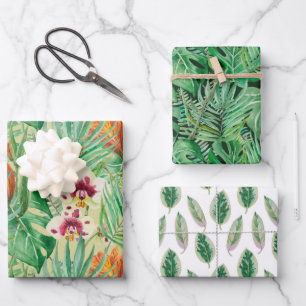 The huge leaves of palm trees and monstera wrapping paper sheet