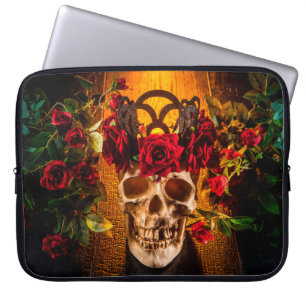 The human skull on the black table lies in the ros laptop sleeve
