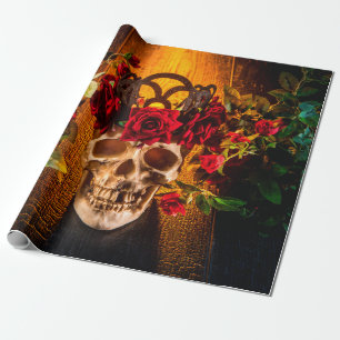 The human skull on the black table lies in the ros wrapping paper