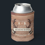 The Hunt's Over Custom Rustic Antler Wedding Favou Can Cooler<br><div class="desc">Custom Wedding Can Cooler, Wedding Favour - The Hunt is Over antlers banner design with personalised couple's initials, the bride and groom's names, wedding date, and location. To change the text, use the personalise option. For more extensive text changes such as changes to the font, font colour, or text size...</div>