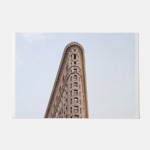 the iconic flatiron building doormat