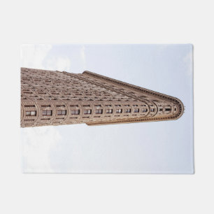 the iconic flatiron building doormat