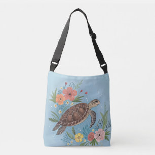 The illustration of a sea turtle crossbody bag
